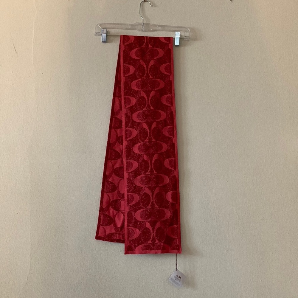 Coach scarf. Measures 60”x7.5”. Shimmery fabric.